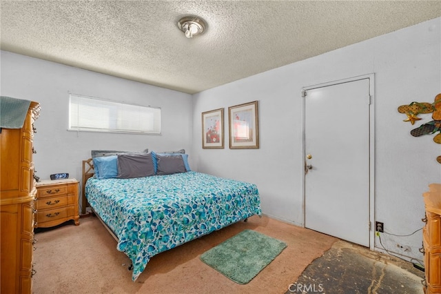 bedroom with a textured ceiling