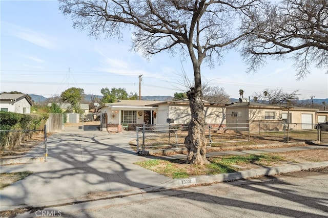 1538 W 15th St, San Bernardino, CA 92411 - ranch-style house featuring a fenced front yard
