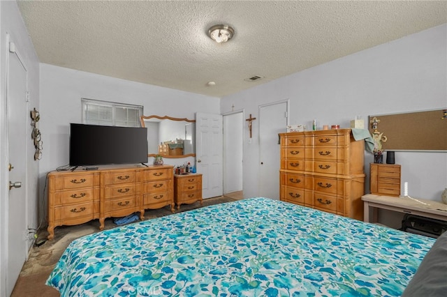 bedroom with a textured ceiling