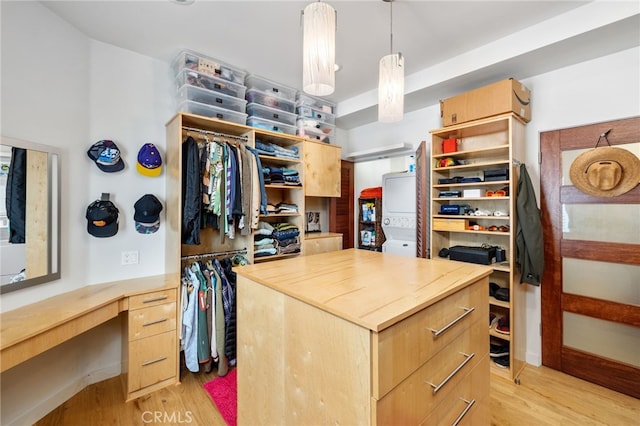 spacious closet with light wood-style floors