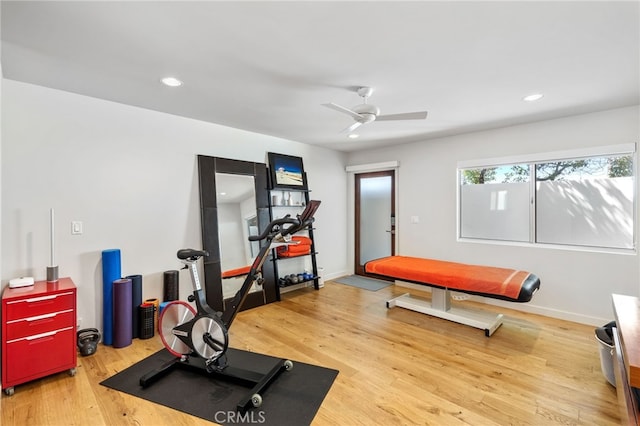 workout room featuring recessed lighting, baseboards, light wood-style flooring, and a ceiling fan