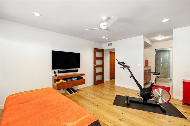 workout area with recessed lighting, baseboards, light wood-type flooring, and ceiling fan