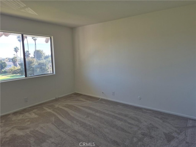 view of carpeted spare room