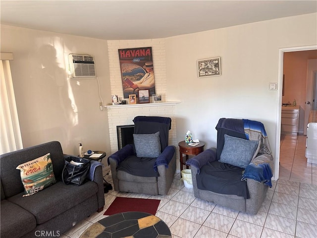 tiled living room featuring an AC wall unit and a fireplace