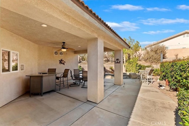 view of patio with ceiling fan