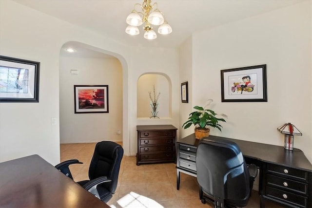 tiled home office with an inviting chandelier