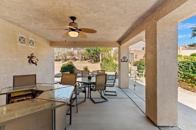 view of patio / terrace featuring ceiling fan