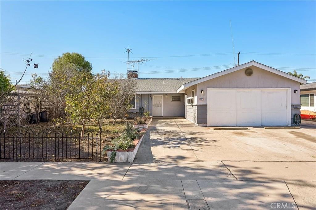 single story home with a garage