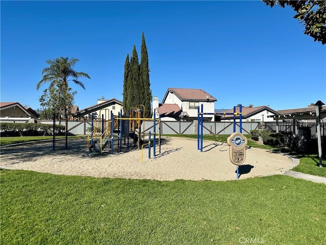 view of playground featuring a lawn