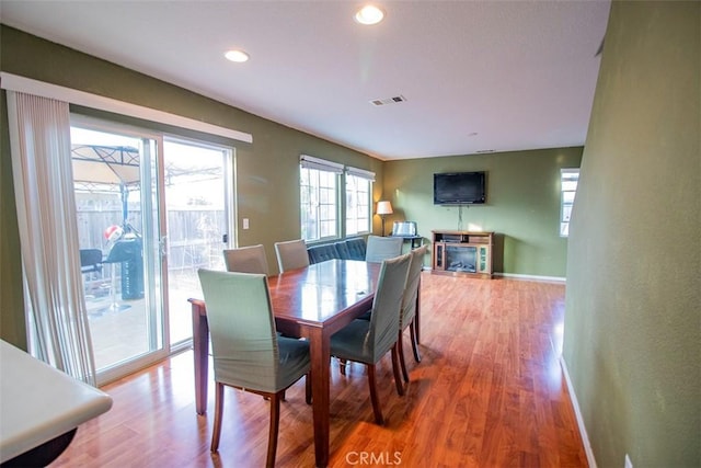 dining room with hardwood / wood-style floors