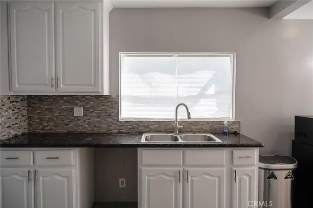 3311 W 79th St, Los Angeles, CA 90043 - kitchen featuring white cabinets, a sink, and decorative backsplash