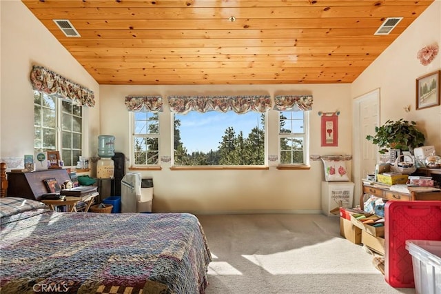 bedroom with vaulted ceiling, multiple windows, and wooden ceiling