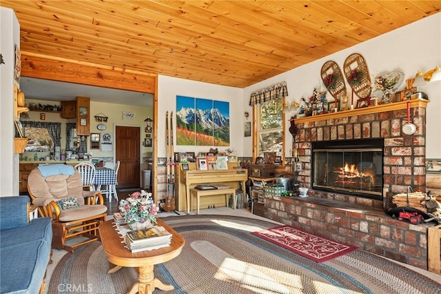 living room with carpet flooring, wood ceiling, and a fireplace