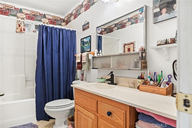 full bathroom with vanity, shower / bath combo, and toilet