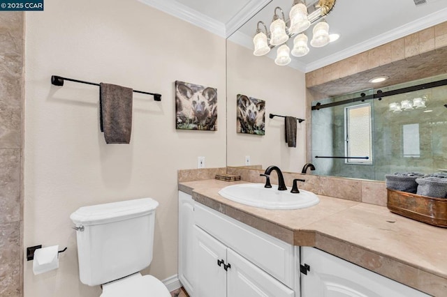 bathroom featuring toilet, vanity, a shower with shower door, and ornamental molding