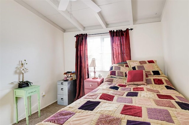 bedroom featuring beamed ceiling, carpet flooring, and ceiling fan