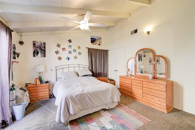 bedroom with carpet flooring, vaulted ceiling with beams, and ceiling fan