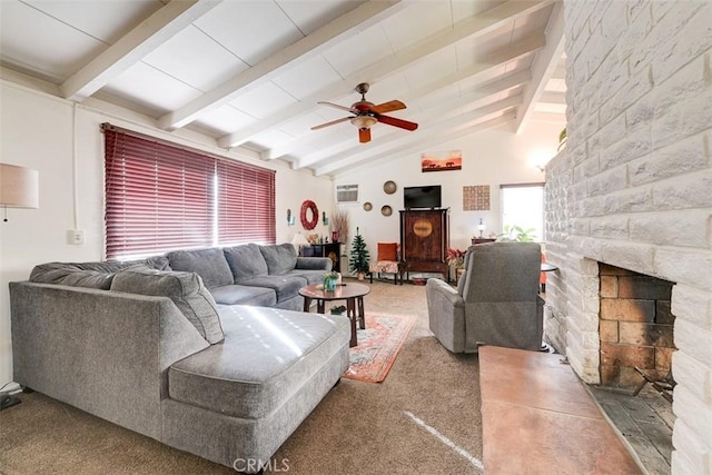 carpeted living room featuring a stone fireplace, ceiling fan, and lofted ceiling with beams