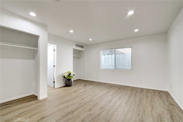 unfurnished bedroom featuring light hardwood / wood-style flooring