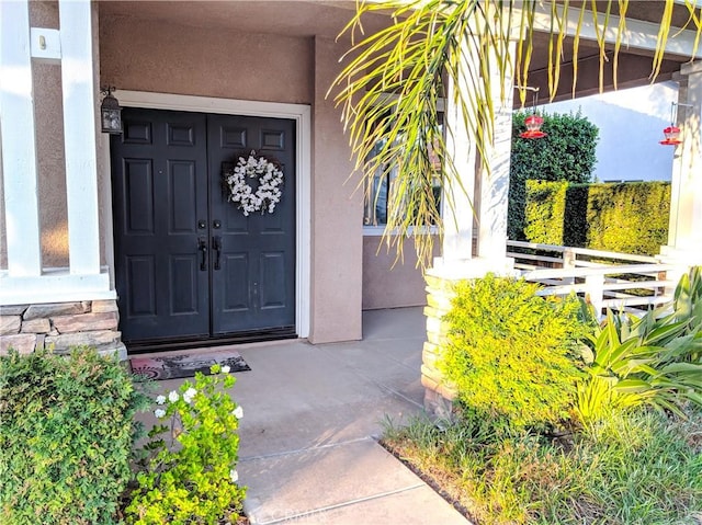 entrance to property with a porch