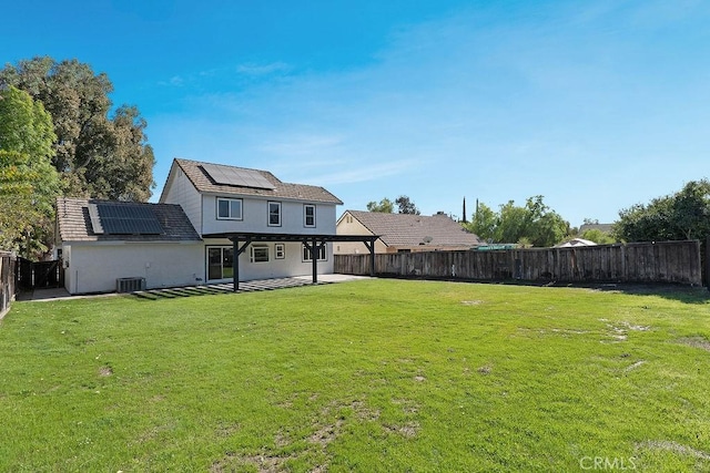 view of yard with a patio area and central air condition unit