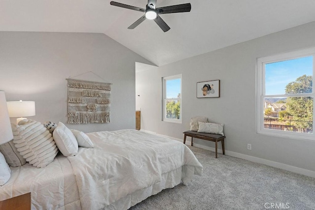 bedroom with carpet flooring, ceiling fan, and lofted ceiling