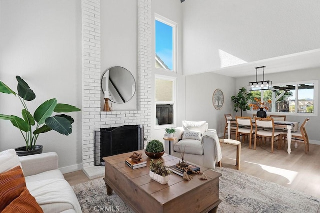 living room featuring a fireplace and light hardwood / wood-style floors