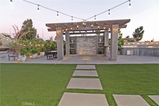 exterior space featuring a pergola and a yard