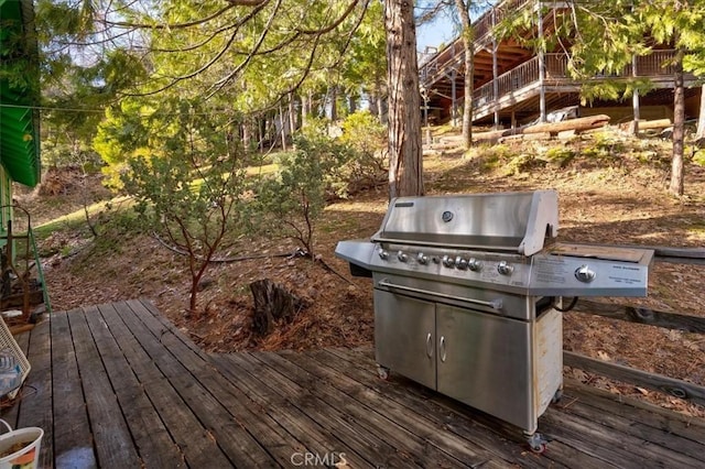 wooden terrace with grilling area