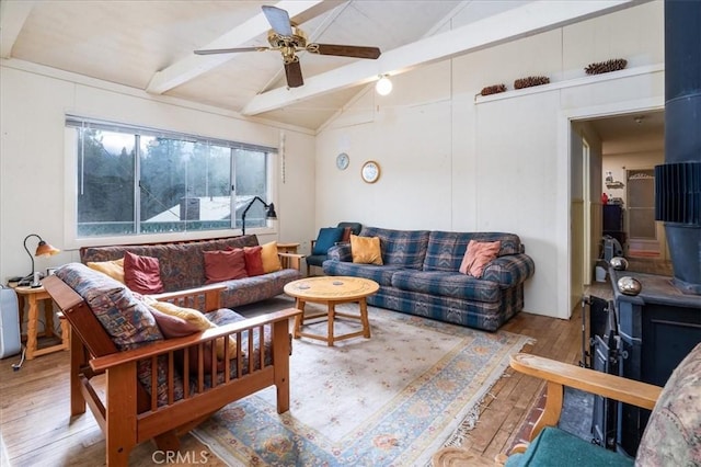 living room with lofted ceiling with beams, light hardwood / wood-style flooring, and ceiling fan