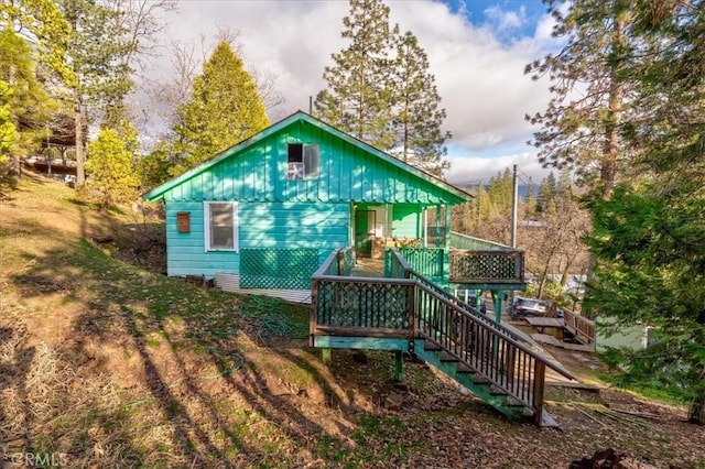 exterior space featuring a wooden deck