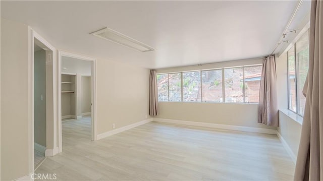 empty room featuring light hardwood / wood-style floors