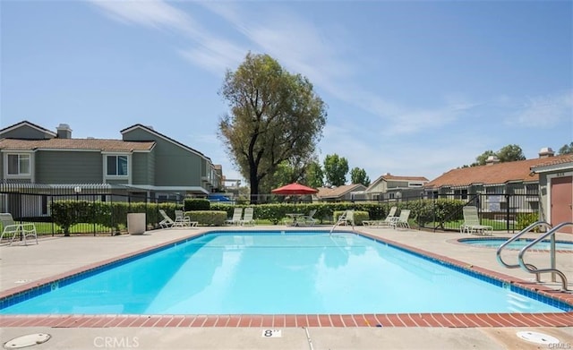 view of pool with a patio area