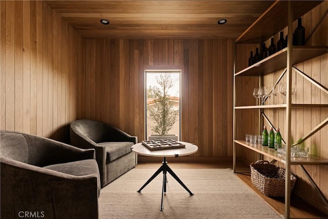 living area with wooden ceiling