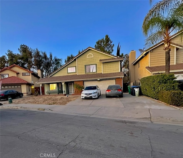 front of property featuring a garage