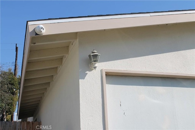 details featuring stucco siding