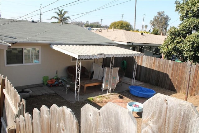 view of patio featuring a fenced backyard