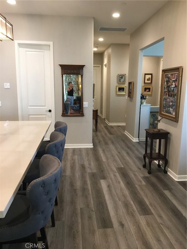 interior space with dark wood-type flooring