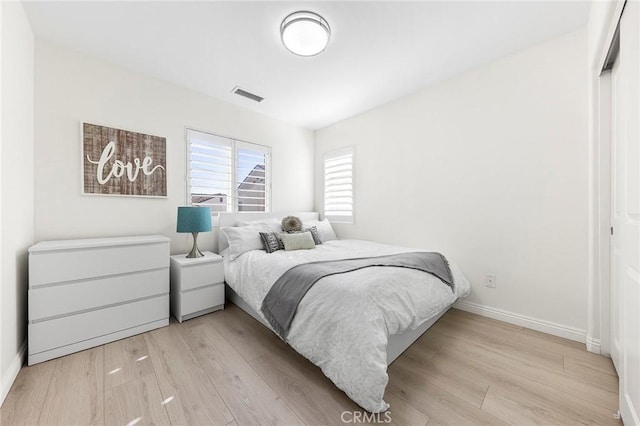 bedroom featuring light hardwood / wood-style flooring