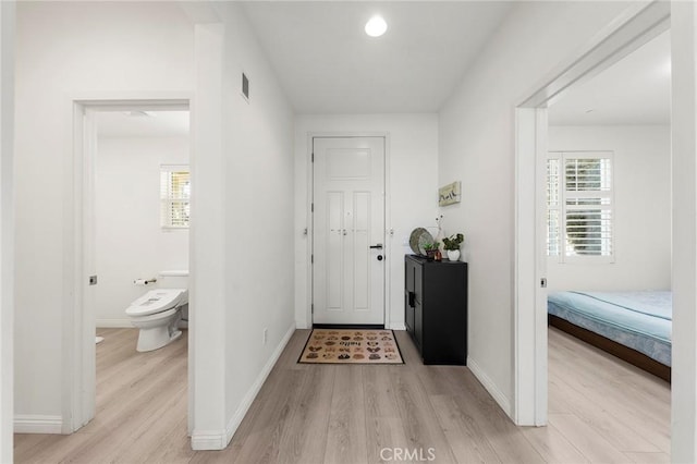 hall featuring light hardwood / wood-style floors