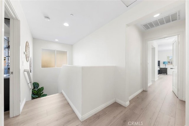 hallway featuring light hardwood / wood-style floors