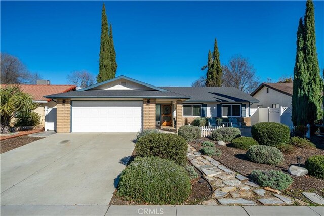 ranch-style house featuring a garage