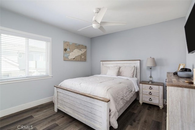 bedroom featuring ceiling fan and dark wood-type flooring