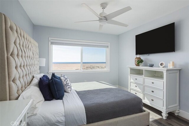 bedroom featuring ceiling fan and hardwood / wood-style floors