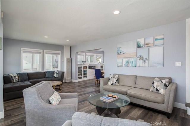 living room featuring dark hardwood / wood-style floors