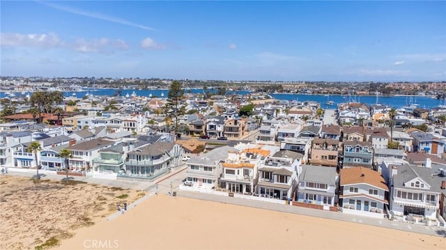 aerial view featuring a water view and a residential view