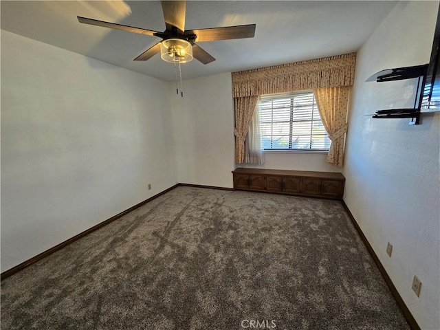 carpeted empty room with ceiling fan