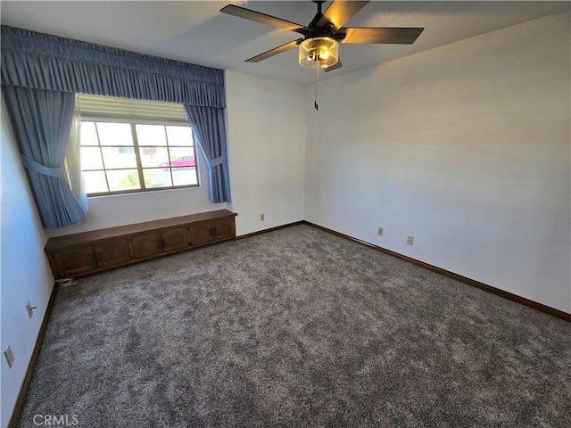 carpeted empty room with ceiling fan