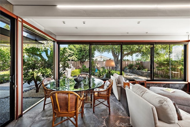 sunroom with plenty of natural light