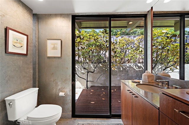 bathroom with vanity and toilet